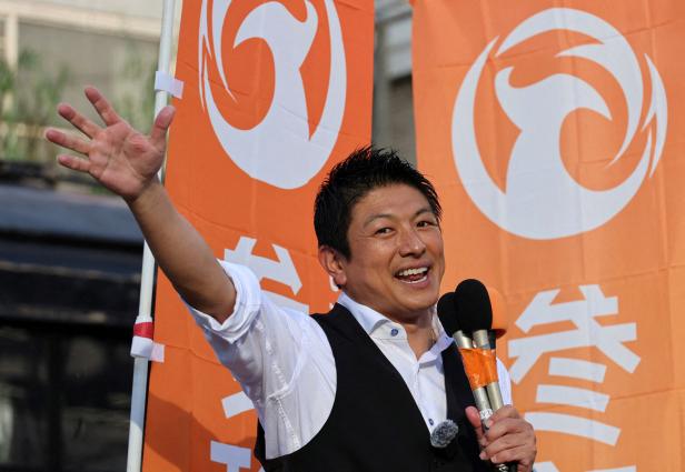 Japan's Sanseito party leader Sohei Kamiya delivers a speech during a party rally in Tokyo
