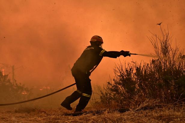Wildfire spreads in Greece's Attica region