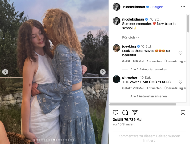 Nicole Kidman mit Tochter Faith Nicole Kidman küsst Tochter Faith auf die Backe. Sie stehen im Freien und tragen sommerliche Kleidung.