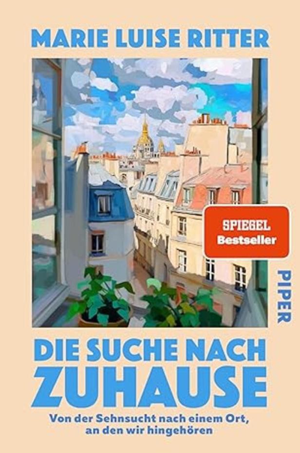 Das Cover des Buches „Die Suche nach Zuhause“ von Marie Luise Ritter zeigt einen Blick über die Dächer von Paris.