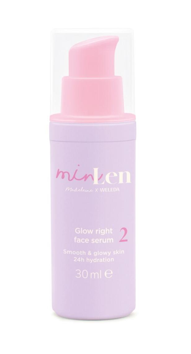 Eine Flasche „Glow right face serum 2“ von Minken x Weleda mit einem rosa Spender.