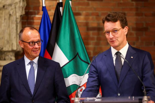 German Chancellor Merz and North Rhine-Westphalia State Premier Wuest attend a NRW state cabinet meeting, in Muenster German Chancellor Merz and North Rhine-Westphalia State Premier Wuest attend a NRW state cabinet meeting, in Muenster