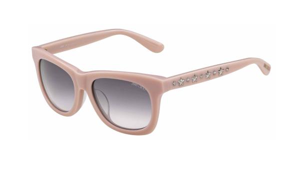 Eine rosafarbene Sonnenbrille von Jimmy Choo mit Sternapplikationen am Bügel.