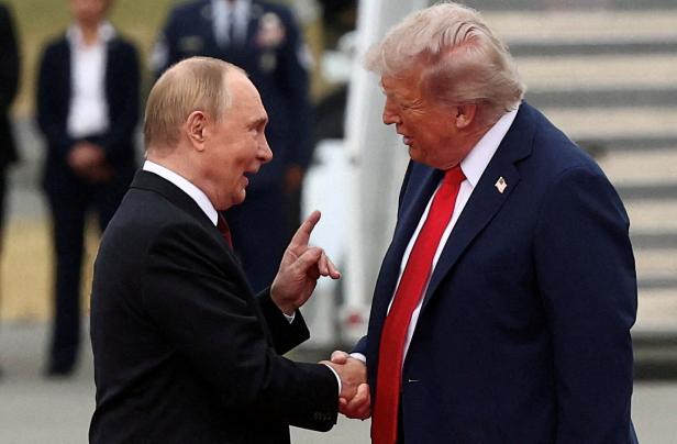 FILE PHOTO: U.S. President Trump meets with Russian President Putin in Alaska FILE PHOTO: U.S. President Trump meets with Russian President Putin in Alaska
