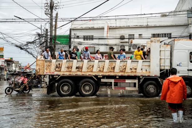 Flooding brought by high tide and Super Typhoon Fung-Wong