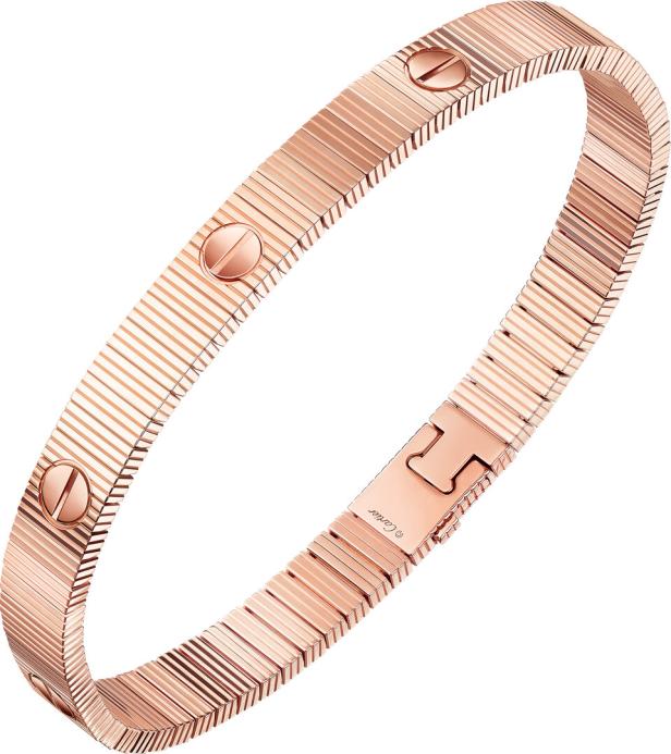Ein rosegoldenes Armband mit Schrauben
