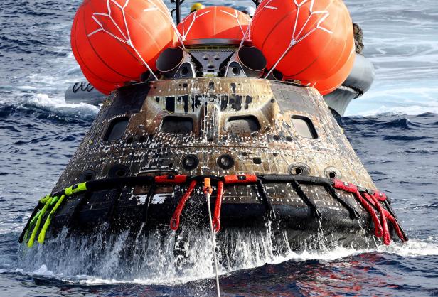 FILE PHOTO: NASA's Orion space capsule splashes down