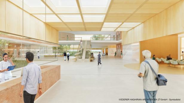 Großzügiger, heller Eingangsbereich mit Empfang, Sitzgelegenheiten, Treppenaufgang und mehreren Personen.