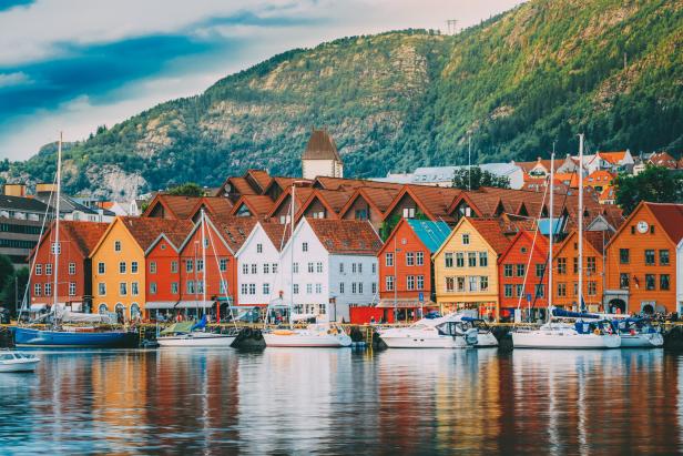 Houses By Sea Against Sky In City