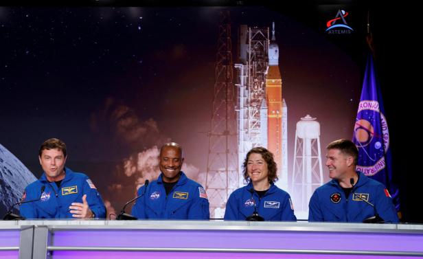 Astronauts for NASA's Artemis II mission, take part in a press conference to discuss progress for their mission around the Moon and back to Earth, at the Kennedy Space Center in Cape Canaveral
