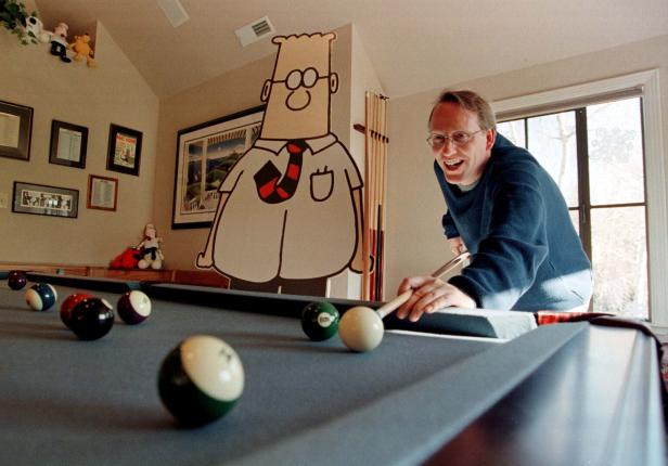 FILE PHOTO: DILBERT PLAYS POOL WITH CREATOR SCOTT ADAMS.