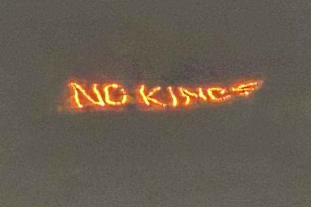 Lit-up sign reading 'No Kings' put up over Davos ahead of Trump visit