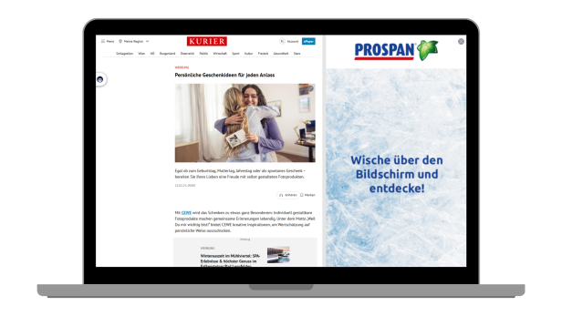Auf einem Laptop ist eine geöffnete KURIER-Webseite mit einem Werbeartikel zu Geschenkideen und einer PROSPAN-Anzeige auf der rechten Seite zu sehen.
