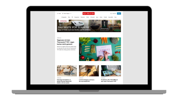 Ein offener Laptop, der eine KURIER-Übersichtsseite mit Advertorials von Vorwerk zeigt.