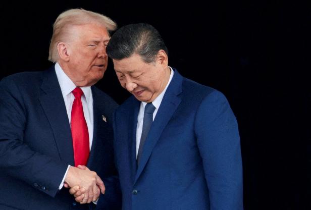 FILE PHOTO: U.S. President Donald Trump and Chinese President Xi Jinping are pictured in South Korea