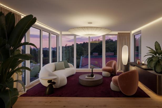 Modern eingerichtetes Wohnzimmer mit großen Fenstern, runden Möbeln, Pflanzen und stimmungsvoller Beleuchtung bei Sonnenuntergang.