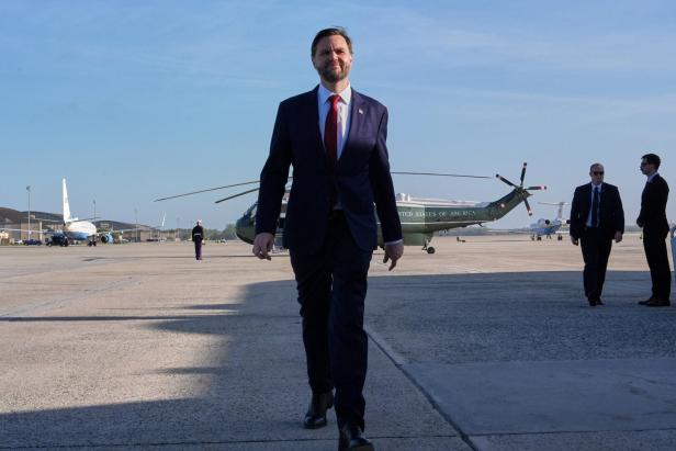 U.S. Vice President JD Vance boards Air Force Two for expected departure to Pakistan for talks on Iran, at Joint Base Andrews