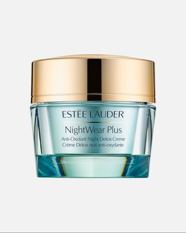 Ein türkisfarbener Cremetiegel mit goldenem Deckel und der Aufschrift „Estée Lauder NightWear Plus“.