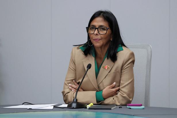FILE PHOTO: Venezuela's acting President Delcy Rodriguez attends a meeting with Colombia's Defense Minister Pedro Sanchez and Foreign Minister Rosa Villavicencio, in Caracas