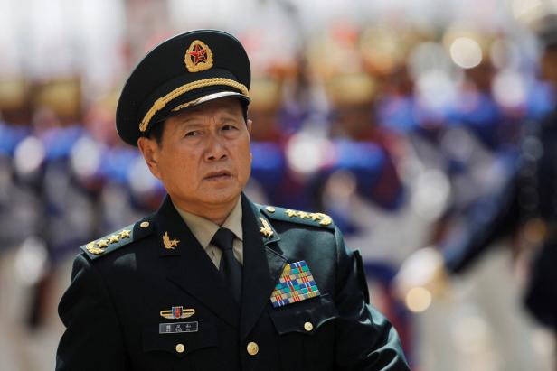 FILE PHOTO:China's Defense Minister General Wei Fenghe reviews the honor guard before meeting with Brazil's Defence Minister Fernando Azevedo e Silva in Brasilia