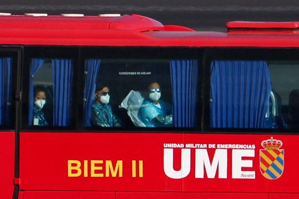 Passengers from cruise ship MV Hondius, which was affected by hantavirus outbreak, arrive to take plane to the Netherlands, at Tenerife Sur airport