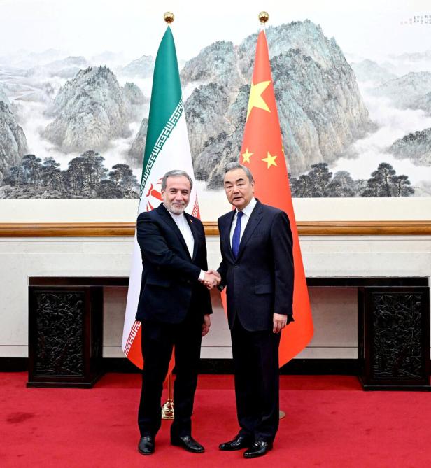 Handout image of Chinese Foreign Minister Wang Yi meeting Iranian Foreign Minister Abbas Araqchi in Beijing