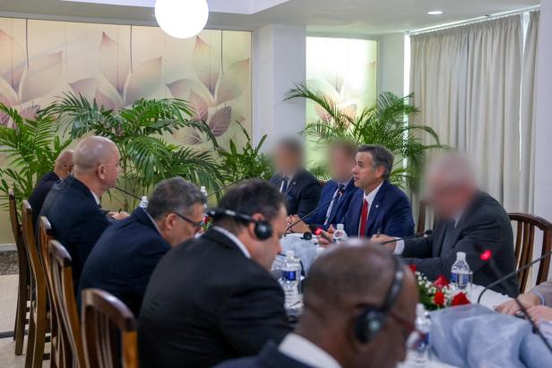 CIA Director John Ratcliffe attends a meeting with Cuban officials at a location given as Havana