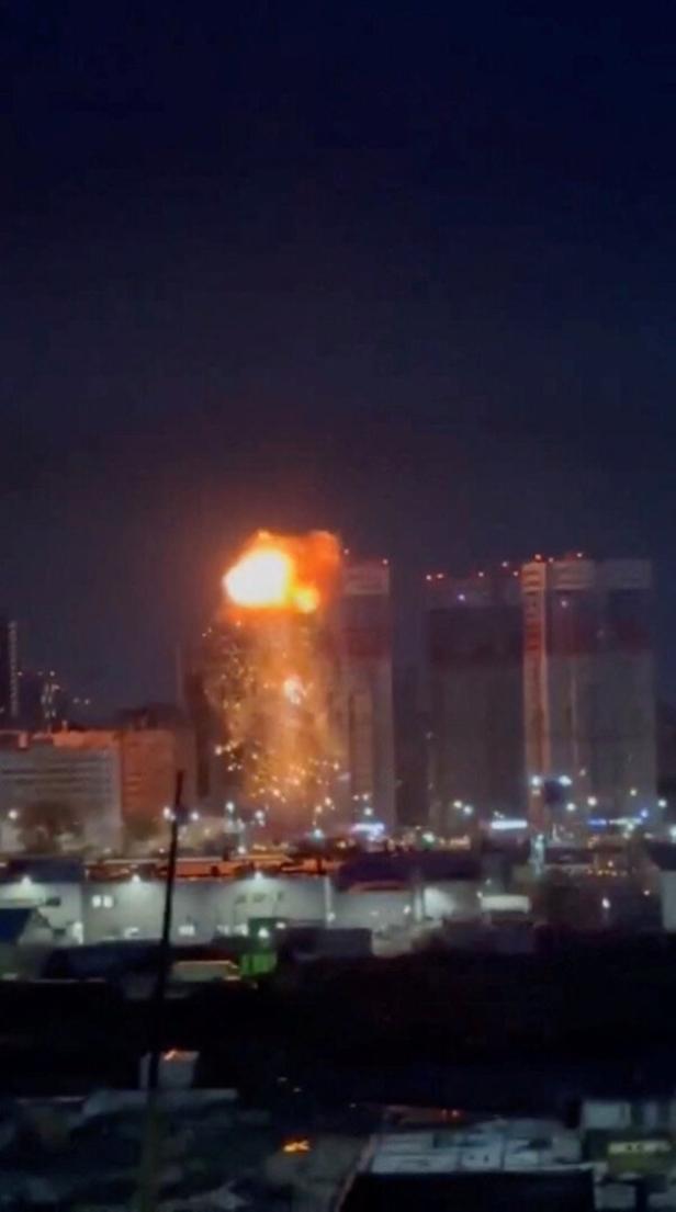 Explosion erupts from an apartment building following a Ukrainian drone attack, in Ryazan
