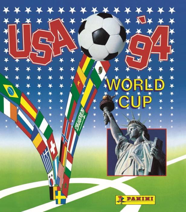 Das Poster zur Fußball-Weltmeisterschaft USA '94 zeigt Flaggen, einen Ball und die Freiheitsstatue.