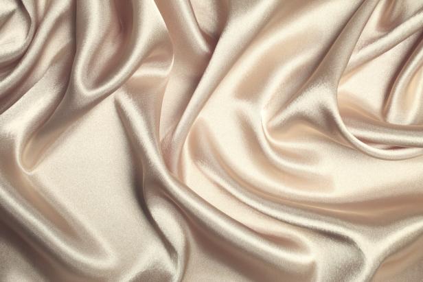Beige Colored Silk Wavy Texture Background