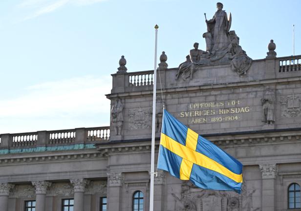 The victims of the attack in Brussels are honored when the Swedish Parliament flags are flown at half-mast while the memorial service takes place, in Stockholm