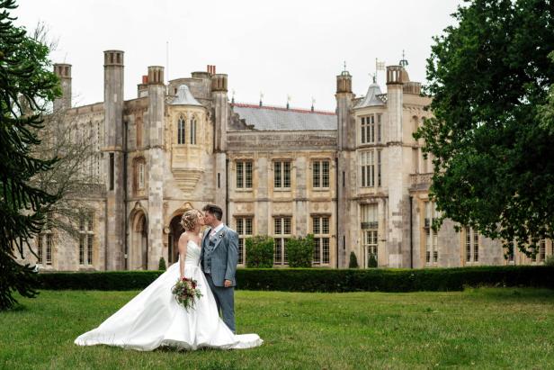 Married Couple in front of castle