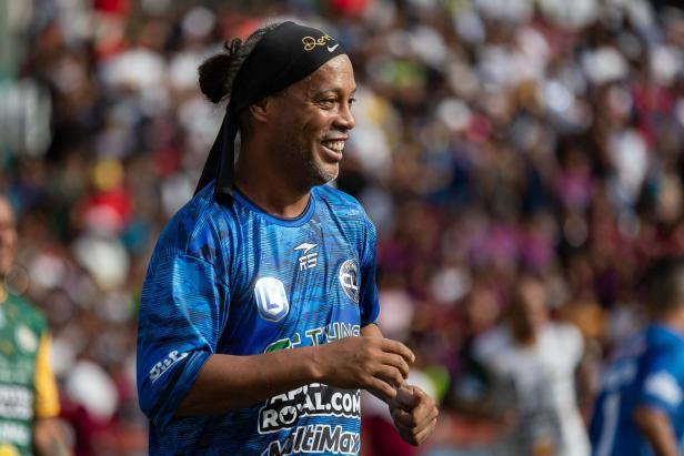 Ronaldinho leads soccer exhibition match in Venezuela's largest slum
