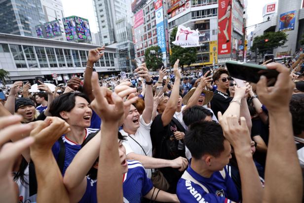 Fans watch the 2026 FIFA World Cup match between Tunisia and Japan in Tokyo