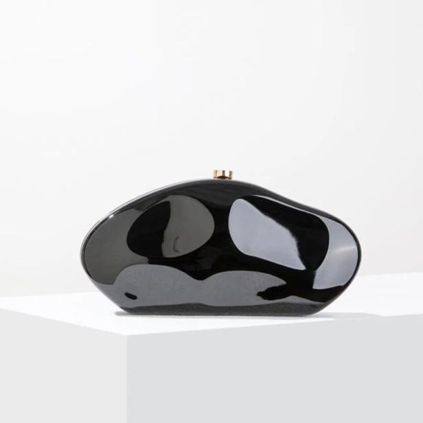 Schwarze Tasche die glänzt