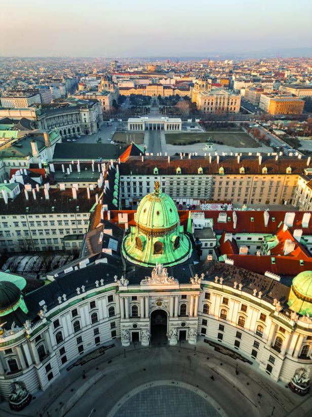 Vienna's Hofburg Palace at sunrise, enjoying a panoramic view of the city