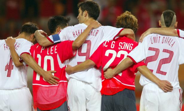 SOUTH KOREA AND TURKEY SOCCER PLAYERS CELEBRATE TOGETHER FOR FANS IN
TAEGU.
