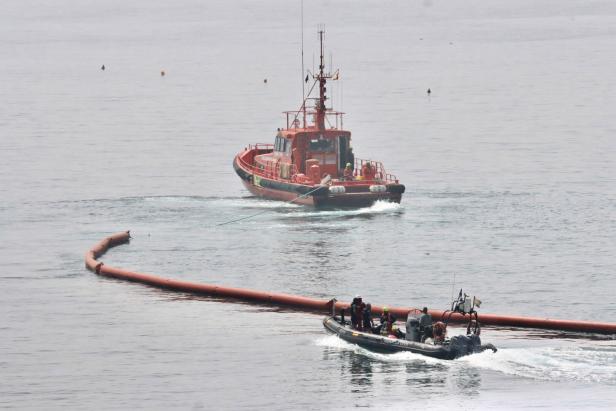 Containment barriers are installed at Ceuta beach