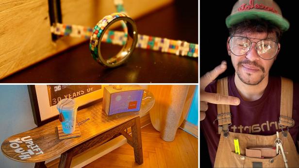 Miguel Castillo präsentiert Schmuck und ein Möbelstück aus alten Skateboards in seinem Wiener Upcycling-Projekt SivarCraftsRebels.