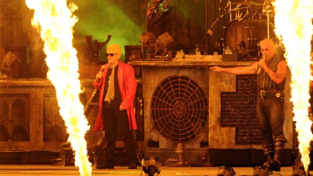epa03810622 German folk singer Heino (L) performs with German rock band Rammstein and their lead singer Till Lindemann (R) at the Wacken Open Air music festival in Wacken, Germany, 01 August 2013. Around 75,000 visitors are expected at the 24th Wacken Open Air heavy metal festival that runs from 01 to 03 August. EPA/Carsten Rehder