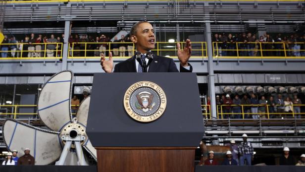 U.S. President Barack Obama speaks at Newport News Shipbuilding in Newport News, Virginia February 26, 2013. Obama is visiting the shipyard to highlight the impact the sequester will have on jobs and middle class families. The cuts fall evenly on non-defense and defense spending, with states like Virginia, heavily dependent on Pentagon contracts, expected to be hardest hit. REUTERS/Kevin Lamarque (UNITED STATES - Tags: POLITICS BUSINESS)