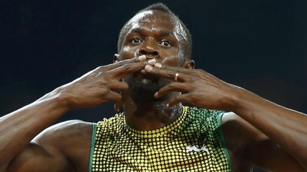 Usain Bolt of Jamaica gestures after winning the men&#039;s 100m race during the London Diamond League &#039;Anniversary Games&#039; athletics meeting at the Olympic Stadium, in east London July 26, 2013. The venue is where the London 2012 Olympic Games were held one year ago. REUTERS/Andrew Winning (BRITAIN - Tags: SPORT ATHLETICS)