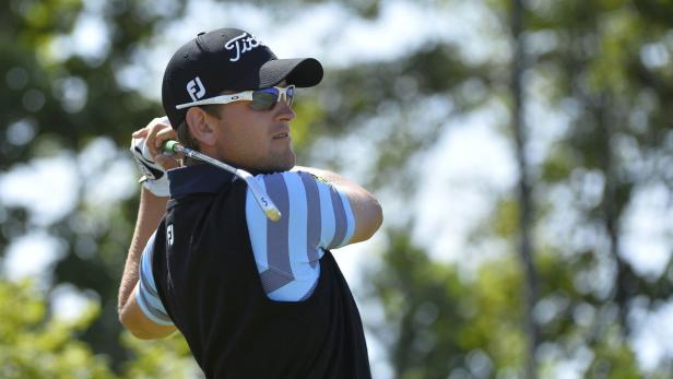 Bernd Wiesberger of Austria watches his tee shot on the second hole during the third round of the British Open golf Championship at Muirfield in Scotland July 20, 2013. REUTERS/Toby Melville (BRITAIN - Tags: SPORT GOLF)