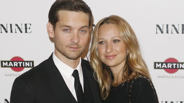 Actor Tobey Maguire (L) and wife Jennifer Meyer Ma
