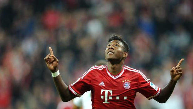 epa03818367 Munich&#039;s David Alaba celebrates after scoring during the German Bundesliga season opener match FC Bayern Munich vs. Borussia Moenchengladbach in Munich, Germany, 09 August 2013. (ATTENTION: EMBARGO CONDITIONS! The DFL permits the further utilisation of up to 15 pictures only (no sequential pictures or video-similar series of pictures allowed) via the internet and online media during the match (including halftime), taken from inside the stadium and/or prior to the start of the match. The DFL permits the unrestricted transmission of digitised recordings during the match exclusively for internal editorial processing only (e.g. via picture databases).) EPA/TOBIAS HASE