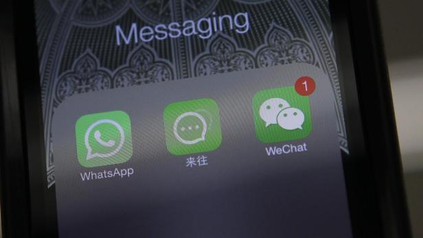 File photo illustration shows icons of messaging a
