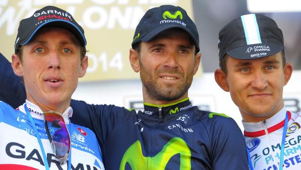 Die Podestbelegung: Sieger Alejandro Valverde (mi.), der zweitplatzierte Daniel Martin und der Dritte Michal Kwiatkowski.