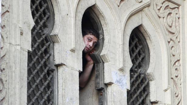 A protester who supports ousted President Mursi lo