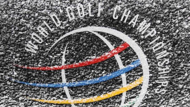 A World Golf Championship sign is covered in snow