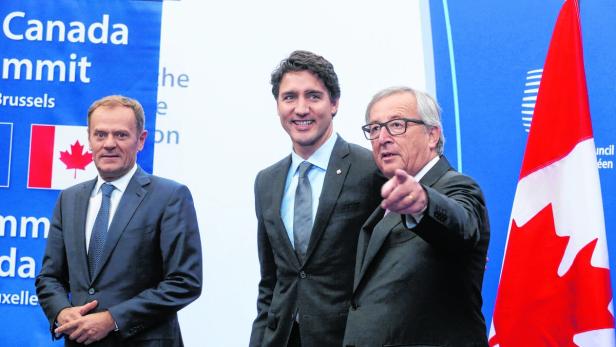 Donald Tusk (l.), Justin Trudeau (M.) und Jean-Claude Juncker